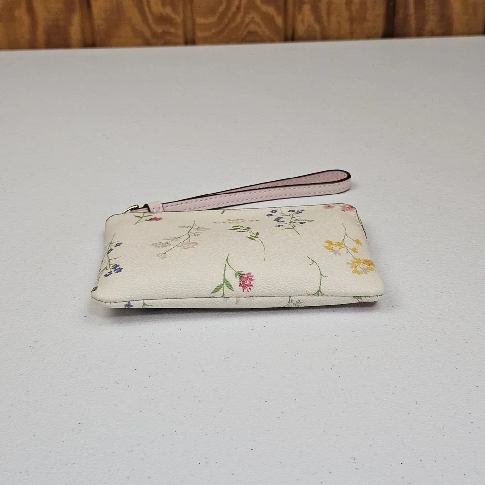 EUC Coach Cream Floral Wristlet